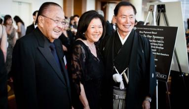 Late Senator Daniel Inouye, Irene Hirano Inoouye, and George Takei all dressed formally and in black at the 2011 Gala Dinner
